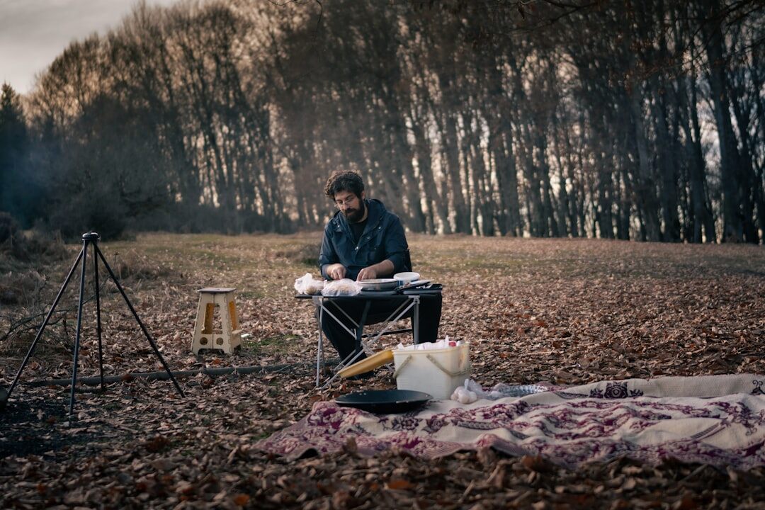 person journaling outdoors